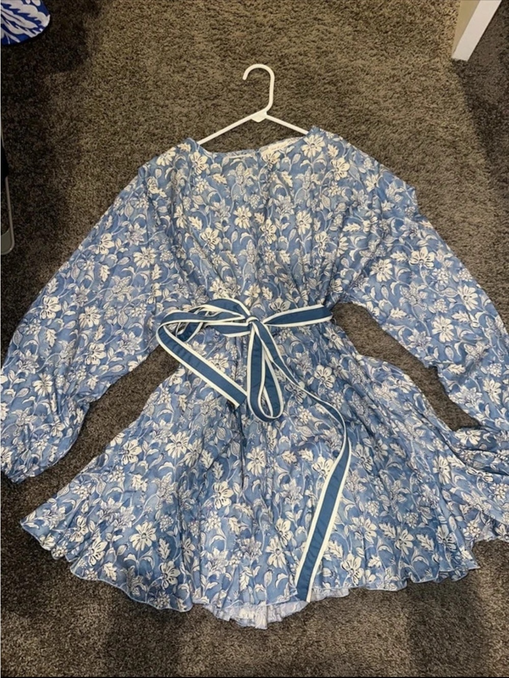 Shop The Mint Women’s Blue Floral Long-Sleeve Peplum Top with Tie Belt
